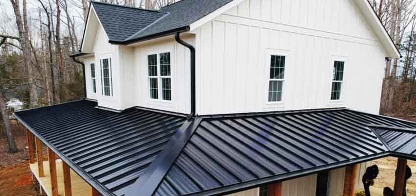 combination-metal-roof-and-shingle-roof-on-home Hingham massachusetts